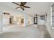 Spacious living room showcasing open layout to the updated kitchen and natural light at 4400 Helena Ne St, St Petersburg, FL 33703