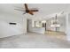 Open floor plan in the living room flowing to the kitchen at 4400 Helena Ne St, St Petersburg, FL 33703