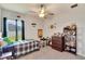 Fun bedroom with a window view and decorative accents at 4435 Devinshire Fields Loop, Plant City, FL 33567