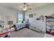 Bright room featuring a bed, toys, and a sunny window at 4435 Devinshire Fields Loop, Plant City, FL 33567