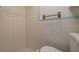 Toilet and tile surround at 4842 Odyssey Ave, Holiday, FL 34690