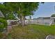 Expansive backyard featuring lush lawn and manicured landscaping, perfect for outdoor enjoyment at 513 Fairhope Dr, Apollo Beach, FL 33572