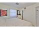 Well-lit bedroom featuring neutral walls and a decorative picture at 513 Fairhope Dr, Apollo Beach, FL 33572