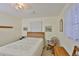 Bedroom with hard wood bed frame and plenty of natural light at 513 Fairhope Dr, Apollo Beach, FL 33572