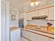 Efficient kitchen with white cabinets, modern appliances, and plenty of counter space for food preparation at 513 Fairhope Dr, Apollo Beach, FL 33572