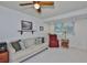 Cozy living room featuring comfortable seating, ample natural light, and a relaxing atmosphere at 513 Fairhope Dr, Apollo Beach, FL 33572