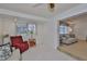 Welcoming living room with lots of natural light, cozy furniture, and open flow to adjacent spaces at 513 Fairhope Dr, Apollo Beach, FL 33572