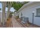 Charming walkway with lush landscaping and whimsical decor accents at 513 Fairhope Dr, Apollo Beach, FL 33572
