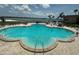 Expansive community pool with plenty of lounge chairs and an ocean view at 5220 Brittany S Dr # 1306, St Petersburg, FL 33715
