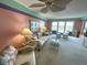 Cozy living room featuring a sitting area, open space and natural light overlooking the water at 5220 Brittany S Dr # 1306, St Petersburg, FL 33715
