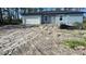 Exterior of home showcasing construction and a front yard with a driveway at 5229 Chaney Ter, Port Charlotte, FL 33981