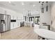 Bright community kitchen with stainless steel appliances, modern cabinetry, and an island at 5810 Fieldmoor Ct, Palmetto, FL 34221