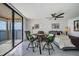 Bedroom area with water view, seating for two, and a ceiling fan at 6322 Palma Del Mar S Blvd # 1107, St Petersburg, FL 33715