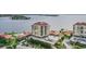 Exterior of the condo complex with parking, community pool and bay views at 6322 Palma Del Mar S Blvd # 1107, St Petersburg, FL 33715