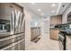 Updated kitchen with stainless steel appliances, ample cabinetry, and tile flooring at 6322 Palma Del Mar S Blvd # 1107, St Petersburg, FL 33715