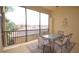 Screened-in patio featuring outdoor seating with a table and seating for six at 6715 Grand Estuary Trl # 203, Bradenton, FL 34212
