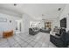 Open-concept living room featuring tile floors and lots of space at 7330 Fairwood Ave, New Port Richey, FL 34653