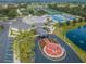 Aerial view of the community recreation center with tennis courts, a lake, and lush landscaping, offering resort-style amenities at 801 Oakmont Ave, Sun City Center, FL 33573