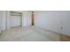 Bedroom featuring a closet and neutral walls, ready for customization at 801 Oakmont Ave, Sun City Center, FL 33573