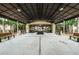 Donald & Nancy Morse Community Hall entryway with benches and glass doors at 801 Oakmont Ave, Sun City Center, FL 33573
