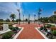 Veteran's Memorial with walkway, monuments, landscaping and flags at 801 Oakmont Ave, Sun City Center, FL 33573