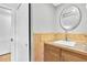 Bathroom features wood accents, sink, and vanity at 8263 132Nd St, Seminole, FL 33776