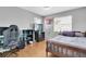 Cozy bedroom features natural light and neutral color scheme, providing a comfortable and relaxing atmosphere at 8263 132Nd St, Seminole, FL 33776