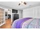 Bedroom with ceiling fan, closet, and an office at 8263 132Nd St, Seminole, FL 33776