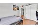 Comfortable bedroom with hardwood floors and closet, providing a peaceful retreat and practical storage solutions at 8263 132Nd St, Seminole, FL 33776
