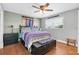 Cozy bedroom with a ceiling fan and a full sized bed at 8263 132Nd St, Seminole, FL 33776