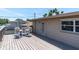 Spacious rooftop deck with outdoor seating and a neutral color scheme, perfect for relaxing and entertaining at 8263 132Nd St, Seminole, FL 33776