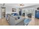 Cozy living room with a large window, comfortable seating, and stylish decor at 8263 132Nd St, Seminole, FL 33776