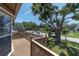Serene porch view with a cozy seating area and lush greenery, perfect for relaxing outdoors at 8263 132Nd St, Seminole, FL 33776