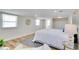 Spacious bedroom features hardwood floors, natural light, and a serene ambiance at 9097 Southern Comfort Dr, Largo, FL 33773