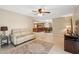 Comfortable living room with modern floors that open to the kitchen and dining area at 9307 Golf View Dr, New Port Richey, FL 34655