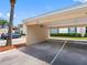 Assigned carport parking space with ample room for parking and protection from the elements at 10356 Carrollwood Ln # 204, Tampa, FL 33618