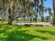 Beautiful lake view of the community featuring a serene body of water at 10356 Carrollwood Ln # 204, Tampa, FL 33618