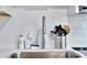 A sleek stainless steel sink with modern faucet and subway tile backsplash at 10664 Starkey Rd, Seminole, FL 33777