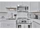 Modern kitchen featuring stainless steel appliances, a sink, and countertop appliances, making it a functional and stylish design at 10664 Starkey Rd, Seminole, FL 33777