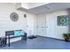 Covered patio with bench seating and neutral decor at 10664 Starkey Rd, Seminole, FL 33777