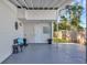 Covered patio leading to backyard at 10664 Starkey Rd, Seminole, FL 33777