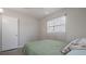 Inviting bedroom features a window and simple decor for a cozy and restful space at 10912 N 61St St, Temple Terrace, FL 33617