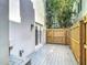 An outdoor deck is accentuated by a wooden fence, offering privacy and charm at 1211 W Horatio St # A, Tampa, FL 33606