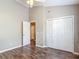 A bright bedroom has plenty of closet space and a connecting hallway at 1211 W Horatio St # A, Tampa, FL 33606