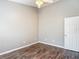 Bedroom with wood-look flooring, neutral paint and a bright, airy feel at 1211 W Horatio St # A, Tampa, FL 33606