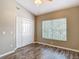 Bedroom with double closet and large window at 1211 W Horatio St # A, Tampa, FL 33606