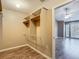 Walk-in closet with wood floors, shelving, and plenty of storage space to meet your needs at 1211 W Horatio St # A, Tampa, FL 33606