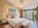 Serene main bedroom with a sitting area and large windows at 1211 W Horatio St # A, Tampa, FL 33606