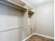 Bright walk-in closet with white shelves providing ample room to organize clothes at 1211 W Horatio St # A, Tampa, FL 33606