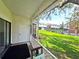 Enclosed patio with an outdoor view and door for privacy at 12701 N 57Th St, Tampa, FL 33617